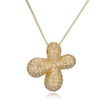 Gold-plated clover pendant necklace with clear pavé stones shown on a reflective white surface - Letter X