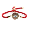Adjustable red woven bracelet with gold-plated copper zircon evil eye charm pendant - Red Rope Style
