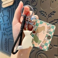Cute cream animal keychain with a black braided wrist strap and a silver bell charm - Off-White Tibetan Fox