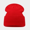 Detailed close-up of ribbed texture on red cuffed knit beanie for winter warmth - One Size / Red