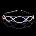 Silver hollow bridal tiara with sparkling crystal rhinestones on a black background - Oval Intertwined Style (FG104)