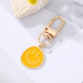 Schlüsselanhänger aus Goldlegierung mit gelbem Smiley-Emaille-Anhänger und U-Federhaken - Gelb