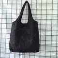 Close-up of elegant black butterfly embroidery on a sheer mesh lace tote bag for women - Black Butterfly Embroidery Mesh Bag