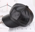 Detail view of black leather newsboy cap with textured finish and button top - One Size 58cm / Black Leather Octagonal Hat