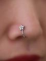 Macro shot of silver five-petal flower nose clip with micro-set zircon stones - Silver Small Flower Style (SE1434)