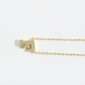 Minimalist gold-plated letter F pendant necklace with pavé cubic zirconia inlay - Letter F