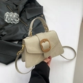 Chic light beige faux leather handbag with a gold woven buckle and adjustable strap - Green