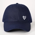 Detailed view of white heart embroidery on navy cotton canvas baseball cap surface - One Size / Navy Blue