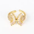 Detail of gold-plated butterfly ring featuring micro-paved white cubic zirconia stones - Adjustable Open / Pavé Large Bowknot Style(XJZ36)