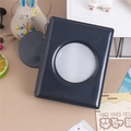 Detail of dark grey glitter photocard album with circular window and metal ball chain - Black Round