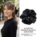 Elegant black pleated scrunchie for women, shown in model hair and flat product view - Black Large 4-Layer