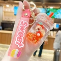 Pink strawberry Capybara keychain with floating liquid sequins and silicone wrist strap - Capybara Holding Strawberry - Milk Cap