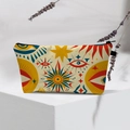 Close-up of bohemian evil eye makeup bag on a geometric stand with lavender accents - 21-Beige Vintage Pattern