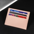 Slim pink PU leather card holder with lychee pattern and multiple slots for cards - Pink