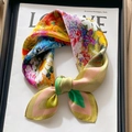 Green and coffee silk scarf with vibrant floral patterns on a fashion magazine - Oil Painting Wilderness Bouquet