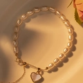 Elegant white freshwater pearl bracelet with a golden heart pendant and adjustable chain - Style B-Freshwater Pearl Bracelet