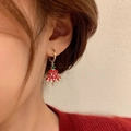 Rotating red Christmas tree earrings with micro-set zircons and golden hooks on model - D0798 Red Christmas Tree Studs
