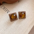 Close-up of vintage brown and amber square resin earrings on a beige fabric background - 57# Silver Pin Coffee Square