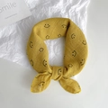 Soft yellow cotton baby bandana bib with smile pattern tied in a decorative bow knot - 45cmx45cm / Turmeric