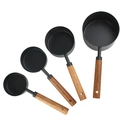 4-piece black stainless steel measuring cup set with acacia wood handles and engravings - Black Measuring Cup Set of 4