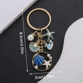 Pink pearl starfish and whale keychain in gold finish with ocean animal enamel charms - ER536-Blue Ocean Shell Dolphin Starfish Shell Pearl