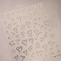 Stickers à ongles cœurs argentés en relief 3D avec textures métalliques, modèle M-541 - Style de Ligne de Coeur en Relief Argent (M-541)