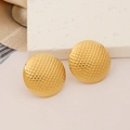 Macro shot of gold circular stud earrings featuring textured polka dot metal surface - Polka Dot Bumpy Texture (Gold 3)