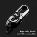 Llavero de coche premium en metal negro con doble anillo, 6,54cm x 2,55cm, peso de 29,5g - Con Logo / Negro