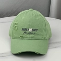 Distressed light green baseball cap with Malinsky embroidery and wide brim - Green