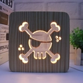 3D wooden night light featuring a hollow pirate skull design with warm LED lighting - Pirate/15cm