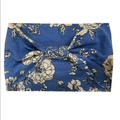 Bohemian yoga headband with blue floral pattern and stylish twist knot detail - Blue Floral
