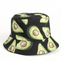 Close-up of durable canvas bucket hat featuring vibrant all-over avocado fruit prints - Avocado Black