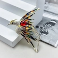 Elegant phoenix brooch with red crystal and colorful enamel inlay in gold plating - Red