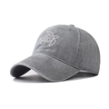 Close-up of a white sea turtle embroidery on a grey washed cotton baseball cap - Adjustable / Grey Turtle