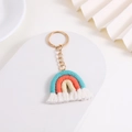 Handmade woven rainbow keychain with blue, orange, beige cotton ropes and white tassel - Light Blue