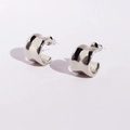 Minimalist wide C-shape silver hoop earrings with polished mirror finish on white background - White Gold