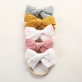 Dettaglio di cinque fasce per neonati in mussola di cotone con morbidi lacci in nylon - Stile Multicolore Tre (3)