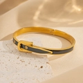 2004 Gold And Black Leather Belt Bracelet