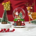 Christmas snow globe with Santa and tree on a red base in a festive holiday setting - Large With Light & Music - Style D