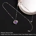 Silver titanium steel heart necklace with a deep purple zircon stone and wing detail - Silver Purple Heart