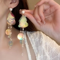 Macro detail of laser sequins and faux pearl tassel earrings on a female model - 14# Silver Pin - Multicolor - Tassel