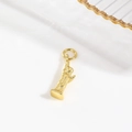 Macro shot of an 18k gold plated Statue of Liberty charm for DIY jewelry making - Statue of Liberty