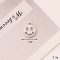 Detail of silver smiley face charm measuring 1cm and weighing 0.5g for DIY jewelry - C322 10mm Silver Winking Smiley