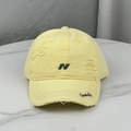 Distressed yellow baseball cap with N embroidery and vintage ripped details for women - Yellow