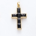 Gold-toned shield cross pendant with six rectangular black gemstones on white background - Black Cross