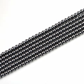 Perles rondes en Terahertz noir 6mm pour création de bijoux DIY sur fond blanc - Perle Ronde 6mm / Gris Foncé/Lustre Métallique