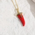 Luxury gold chain necklace featuring red chili pendant with zircons and green gem detail - Red