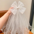 White princess bow hair clip with layered tulle veil and elegant pearl embellishments - Grid Mesh Pearl Veil