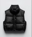 Close-up of black matte faux leather padded vest showing stand collar and quilted texture - XS / Black