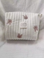 Quilted white cotton mommy bag featuring pink bunny embroidery and adjustable D-rings - Rabbit Pattern